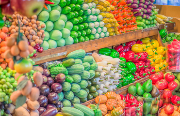 Fruit market with various colorful fresh fruits and vegetables