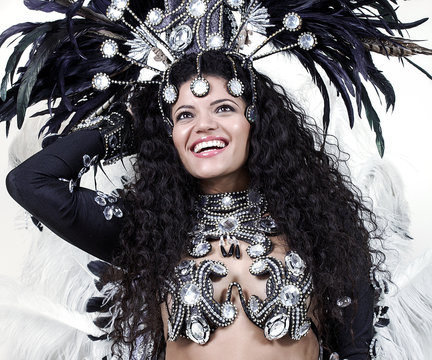 Cheerful samba dancer wearing black costume