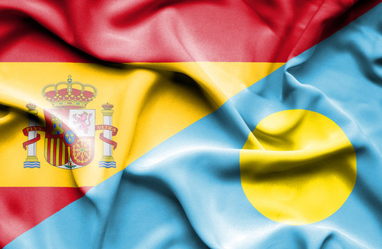 Waving flag of Palau and Spain