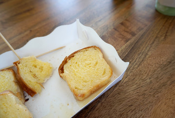 bread and butter toast in the paper box