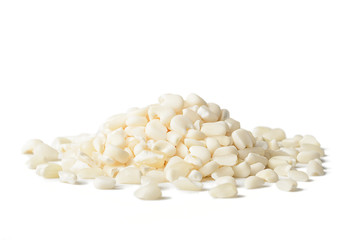 white corn grits on white, tilt shift lens