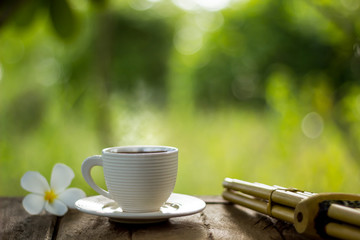 coffee cup on green background