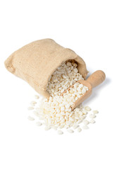 white corn grits in the sack, tilt shift lens