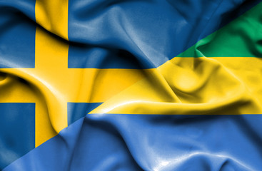 Waving flag of Gabon and Sweden