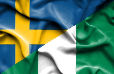 Waving flag of Nigeria and Sweden