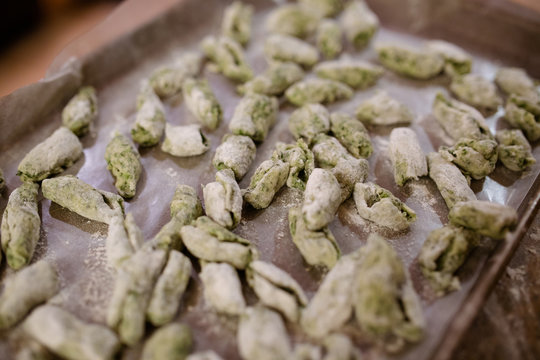 Hand-made spinach gnocchi ready to be cooked