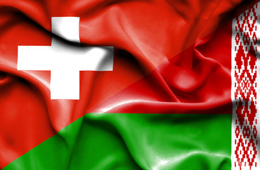 Waving flag of Belarus and Switzerland