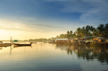 Obraz premium Fishing Village and sunrise