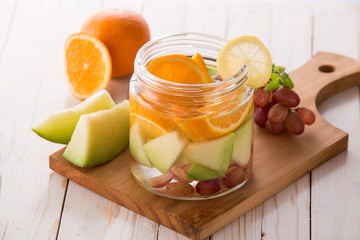 Summer fresh fruit drink. fruit Flavored water mix with orange,