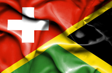 Waving flag of Jamaica and Switzerland