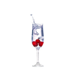 cherry splash in a cocktail glass on white