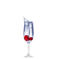 cherry splash in a cocktail glass on white