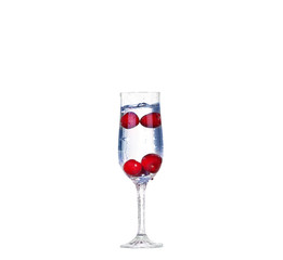 cherry splash in a cocktail glass on white