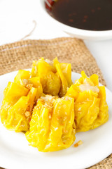 Dim Sum, Chinese Food, chinese steamed dumpling on white plate.