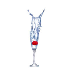 Strawberry splash in a cocktail glass on white