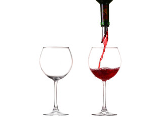 Wine collection - Splashing red wine in a glass. Isolated on white background