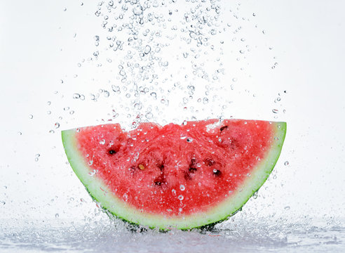 Red watermelon with splash of water