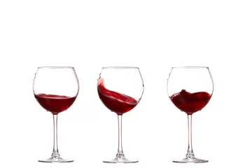 Fotobehang collage Wine collection - Splashing red wine in a glass. Isolated on white background © YURII Seleznov