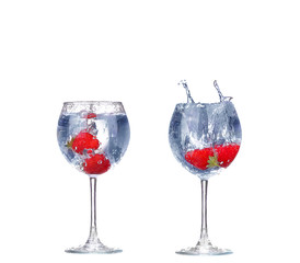collage  Strawberry splash in a cocktail glass on white