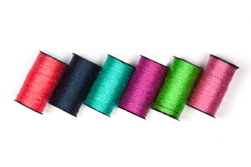 colored spools of threads