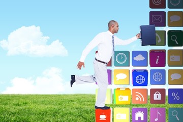 Composite image of businessman running with briefcase