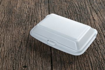 white foam box on wood background