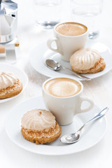 fresh cappuccino and cakes, vertical