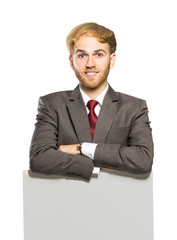 young businessman smiling with whiteboard
