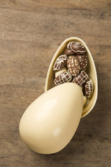 Chocolate Easter Eggs Over Wooden Background