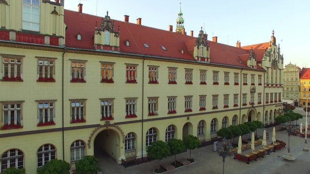 Aerial dynamic footage of Wroclaw, European Capital of Culture 2016 and World Games 2017 in Poland. Center Town Hall, Market Square, Sky Tower, st. Elisabeth Church, City panoramic view. Traveling EU.