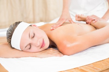 Obraz na płótnie Canvas Blonde enjoying a back massage 