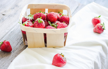 fresh strawberries in a box, rustic, summer raw food, selective