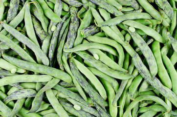 Green fresh soybeans on wood background