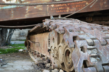 Caterpillar of the old rusted crane