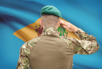 Soldier saluting to USA state flag conceptual series - Delaware