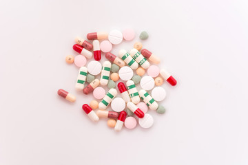 diferent Tablets pills capsule heap mix therapy drugs doctor flu