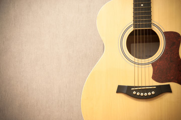 Close up guitar with copy space on gray background - vintage effect