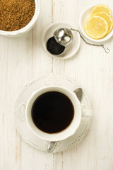 cup of tea with lemon and sugar