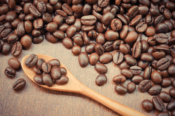 Coffee beans and wooden spoon with filter effect retro vintage s