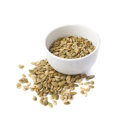 White cup filled with pumpkin seeds