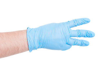 Doctor hand with glove showing number three