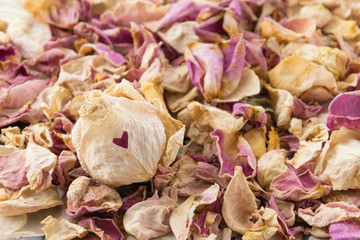 heart on dry pink and white rose