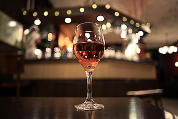 glass of wine restaurant interior serving dinner