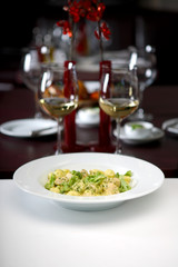 Gnocchi with broccoli in white sauce, shallow depth of field