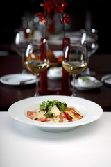 Pasta with prosciutto, arugula and Parmesan cheese, shallow depth of field, 
