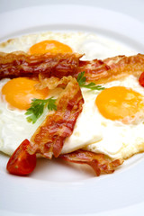 Bake and eggs nicely served on white plate