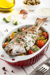 Baked fish trout with vegetables