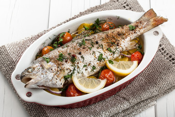 Baked fish trout with vegetables