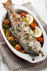 Baked fish trout with vegetables
