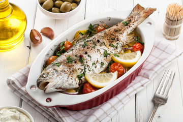 Baked fish trout with vegetables
